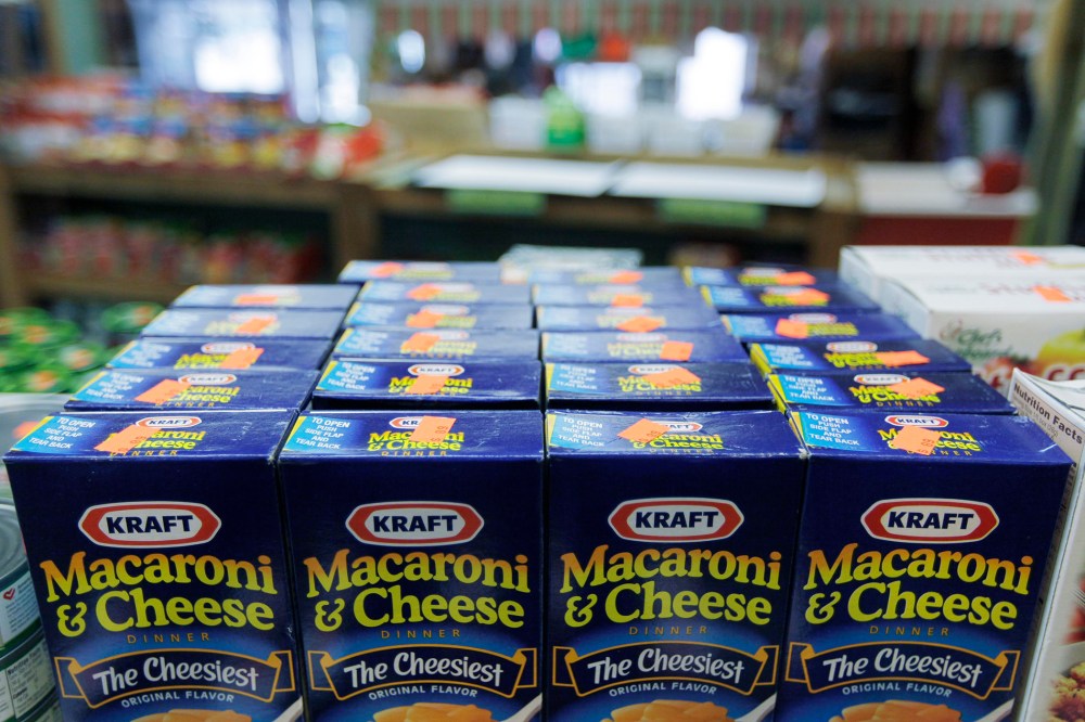 Packages of Kraft Macaroni & Cheese fill the shelves of a store on May 4, 2009, in Chicago Ridge, Ill. (Photo by M. Spencer Green/AP)