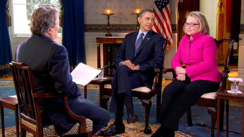 In this Jan. 25, 2013 image taken from video and provided by CBS, President Barack Obama, center, and Secretary of State Hillary Rodham Clinton speak with 60 Minutes correspondent Steve Kroft, left, in the Blue Room of the White House in Washington....