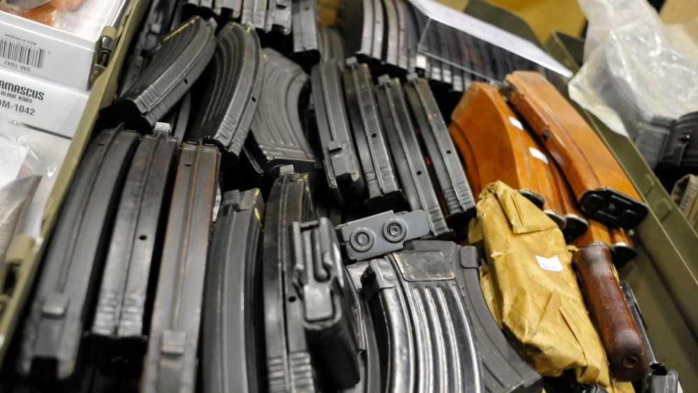 AK-47 assault rifle magazines fill a box at a gun and knife show in White Plains, N.Y., Saturday, June 19, 2010. (AP Photo/Swoan Parker)