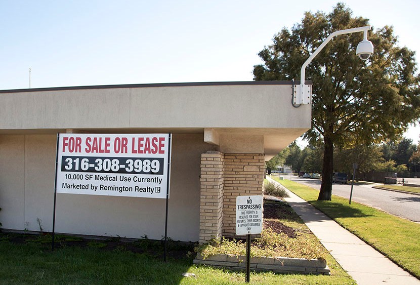 A "for sale" sign is posted outside the Kansas medical clinic formerly operated by murdered abortion provider Dr. George Tiller, Thursday, Oct. 7, 2010, in Wichita, Kan. (Photo by Jeff Tuttle/AP)