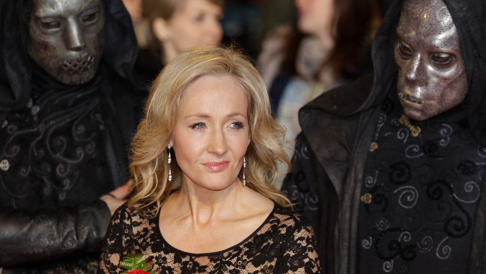 British author JK Rowling poses for the photographers as she attends the world premiere of the latest film' Harry Potter and The Deathly Hallows', at a cinema in central London, Nov. 11, 2010. (Photo by Lefteris Pitarakis/AP)