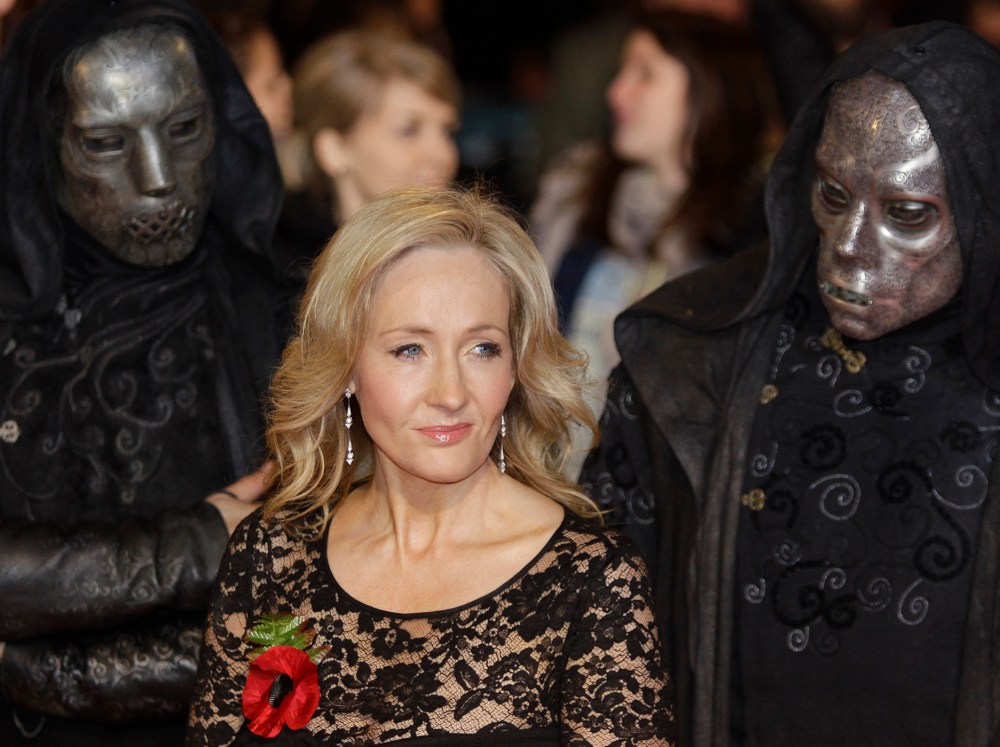 British author JK Rowling poses for the photographers as she attends the world premiere of the latest film' Harry Potter and The Deathly Hallows', at a cinema in central London, Nov. 11, 2010. (Photo by Lefteris Pitarakis/AP)