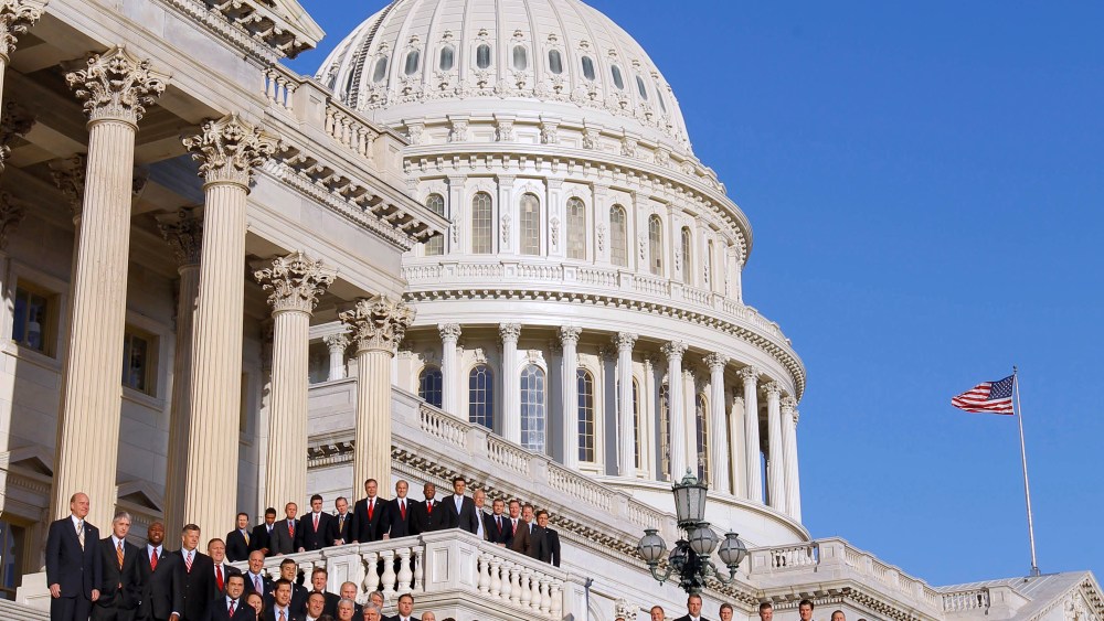The freshmen class of House members of the upcoming 112th Congress, pose for a group photo on the steps that lead to the House of Representatives, on Capitol Hill in Washington, Friday, Nov. 19, 2010. (AP Photo/Alex Brandon)