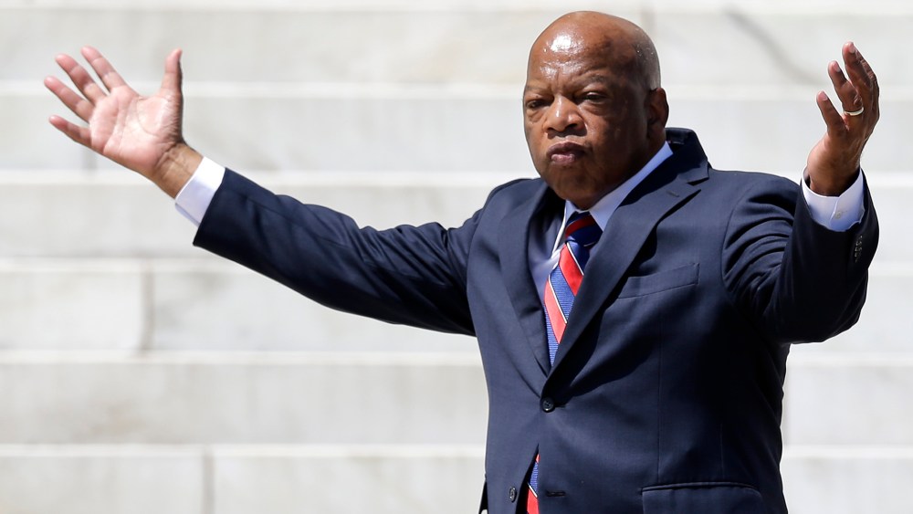 Rep. John Lewis, (D-GA) arrives to speak at a rally to commemorate the 50th anniversary of the 1963 March on Washington on the steps of the Lincoln Memorial on Aug. 24, 2013, in Washington.
