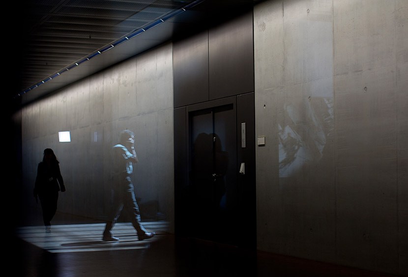 A man walks down the hall during the special meeting of the Parliamentary Control Panel on the spying affair in Berlin, Germany, 25 July 2013.  (Photo by Michael Kappeler/picture-alliance/dpa/A)