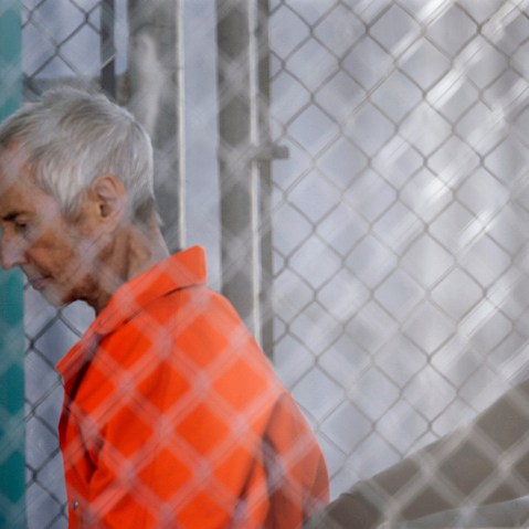 Robert Durst is escorted into Orleans Parish Prison after his arraignment in Orleans Parish Criminal District Court in New Orleans, March 17, 2015. (Photo by Gerald Herbert/AP)
