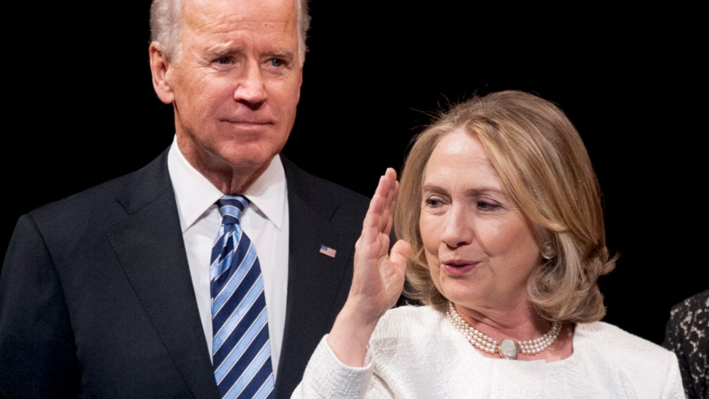 Vice President Joe Biden and former Secretary of State Hillary Rodham Clinton appear onstage at the Vital Voices Global Partnership 2013 Global Leadership Awards gala at the Kennedy Center for the Performing Arts in Washington, Tuesday, April 2, 2013. ...