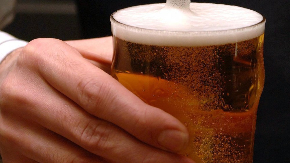Beer prices rise on VAT hike.File photo dated 19/03/07 of a bartender pouring a pint of lager as the VAT hike will lead to the typical cost of a pint of beer in a pub breaking through the &pound;3 barrier for the first time. Issue date: Tuesday January...