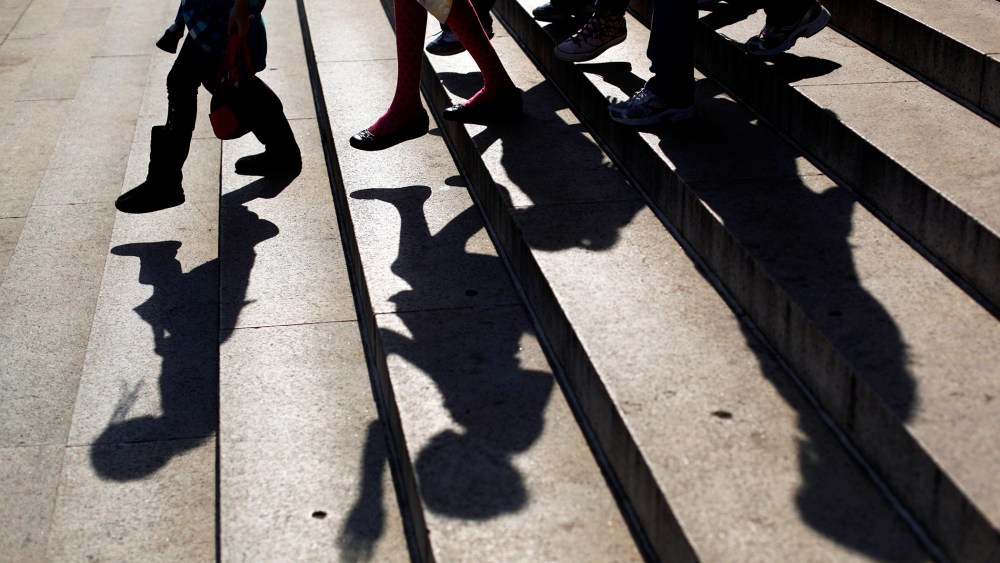 School children walk on the street in Philadelphia, Pa.