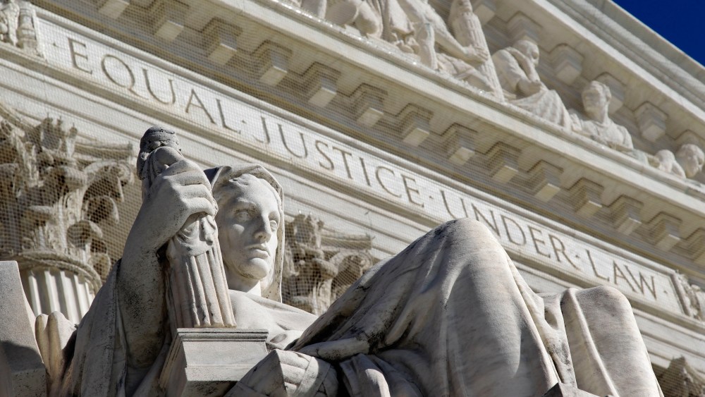 File Photo: The west facade of the U.S. Supreme Court. (Photo by: J. Scott Applewhite/AP Photo)