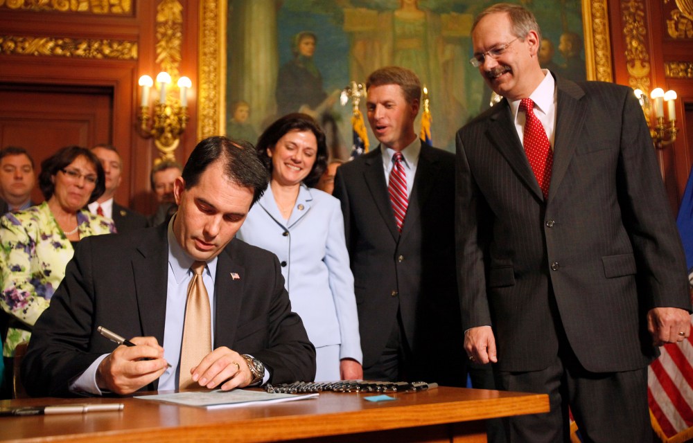 Wisconsin Gov. Scott Walker during a signing ceremony for the Voter ID Bill (AB-7) at the state Capitol in Madison, Wis., Wednesday, May 25, 2011. M.P. King-State Journal