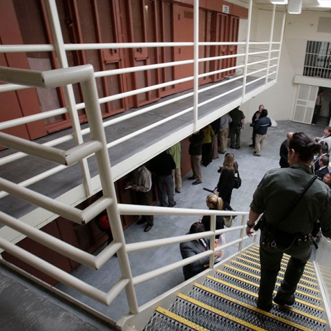 Reporters inspect one of the two-tiered cell pods in the Secure Housing Unit at the Pelican Bay State Prison near Crescent City, Calif., Wednesday, Aug. 17, 2011.  (Photo by Rich Pedroncelli/AP)