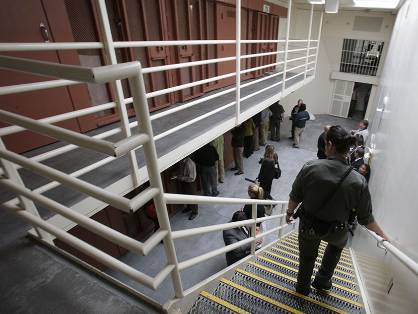 Reporters inspect one of the two-tiered cell pods in the Secure Housing Unit at the Pelican Bay State Prison near Crescent City, Calif., Wednesday, Aug. 17, 2011. (Photo by Rich Pedroncelli/AP)