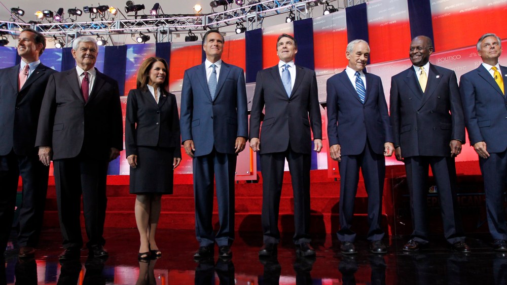Republican presidential candidates stand together before a Republican presidential candidate debate at the Reagan Library in Simi Valley, Calif on Sept 7, 2011.