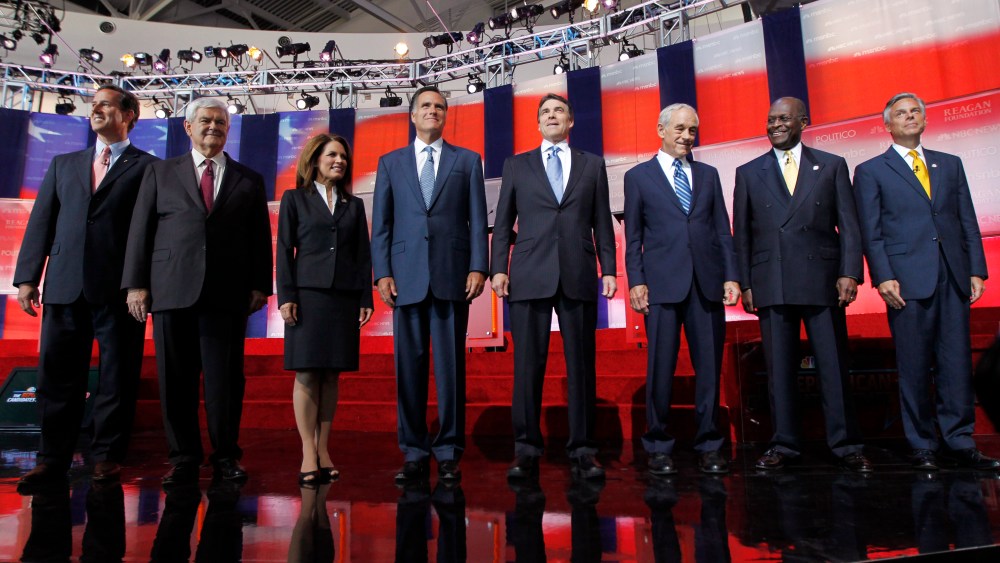 FILE - In this Sept. 7, 2011, file photo Republican presidential candidates stand together before a Republican presidential candidate debate.  (AP Photo/Chris Carlson, File)
