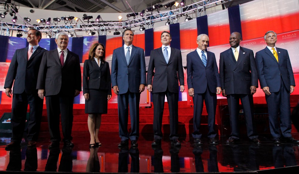 FILE - In this Sept. 7, 2011, file photo Republican presidential candidates stand together before a Republican presidential candidate debate.  (AP Photo/Chris Carlson, File)