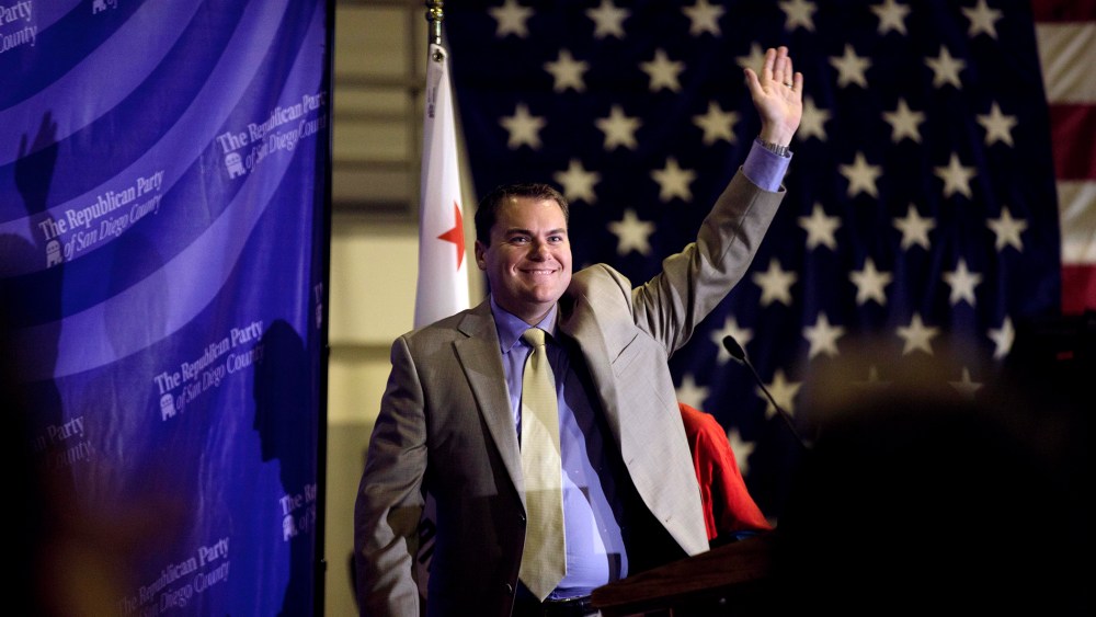 Carl DeMaio walks on stage during an event in La Jolla, Calif. on Sept. 7, 2011.