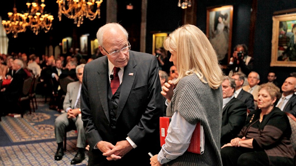 Former Vice President Dick Cheney, speaks with his daughter Liz Cheney before discussing his memoir "In My Time" on Sept. 19, 2011 in Chicago.