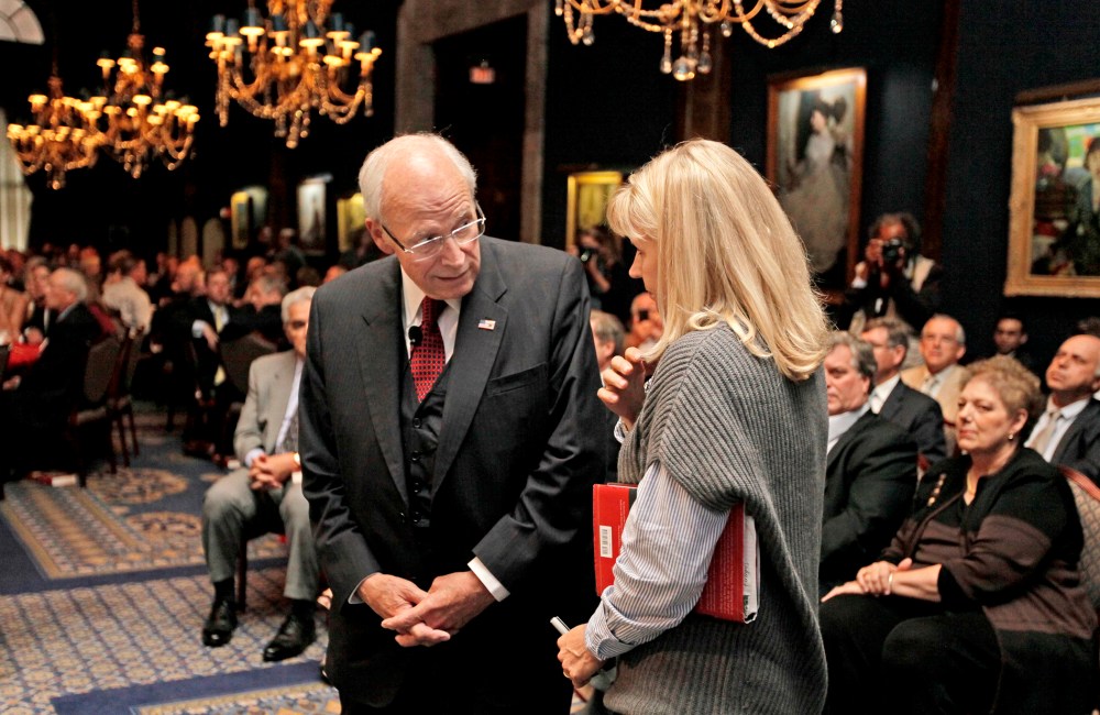Former Vice President Dick Cheney, speaks with his daughter Liz Cheney before discussing his memoir "In My Time" on Sept. 19, 2011 in Chicago.