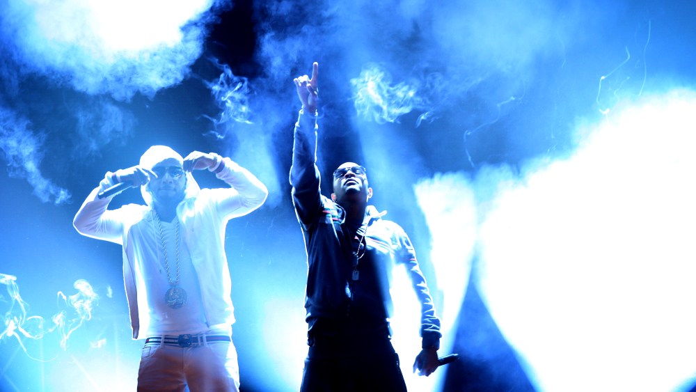 Rapper T.I., center, and Young Jeezy, left, perform during the BET Hip Hop Awards, Oct. 1, 2011 in Atlanta. (Photo by David Goldman/AP)