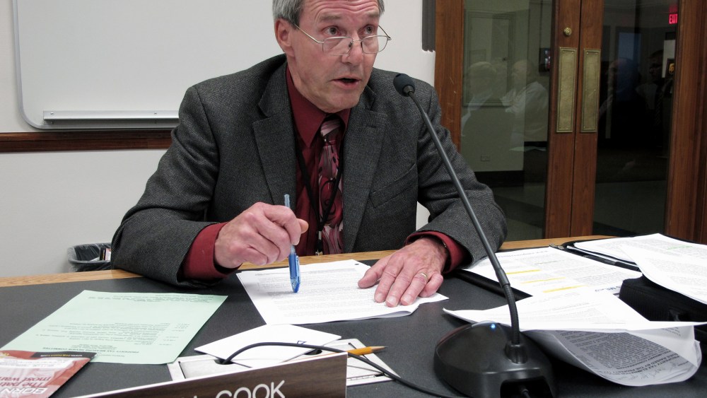 North Dakota state Sen. Dwight Cook, a Republican from Mandan, asks a question during a legislative hearing in Bismarck, N.D. on Nov. 2, 2011.