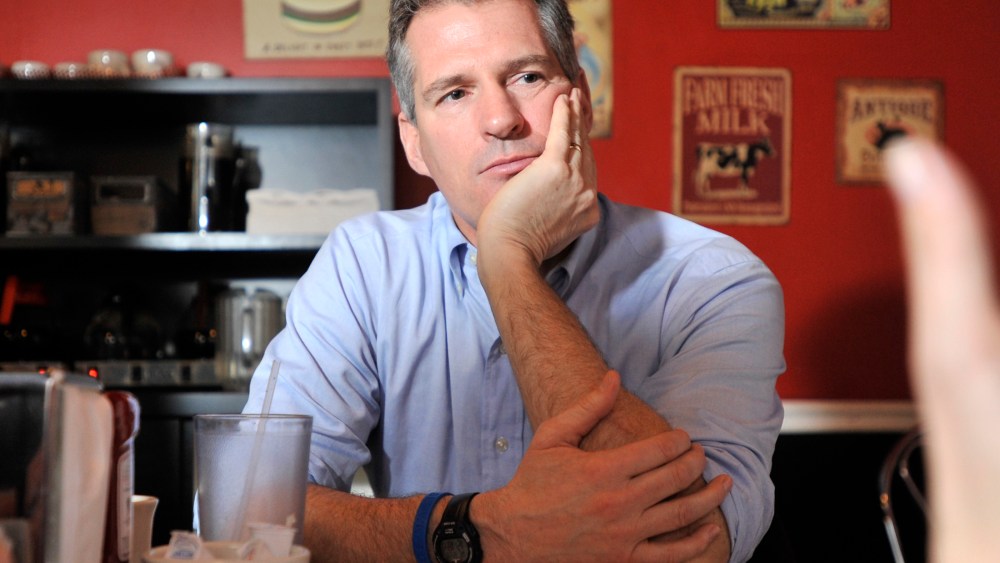 Sen. Scott Brown, R-Mass., speaks with reporters at Mul's Diner in Boston on Dec. 28, 2011.