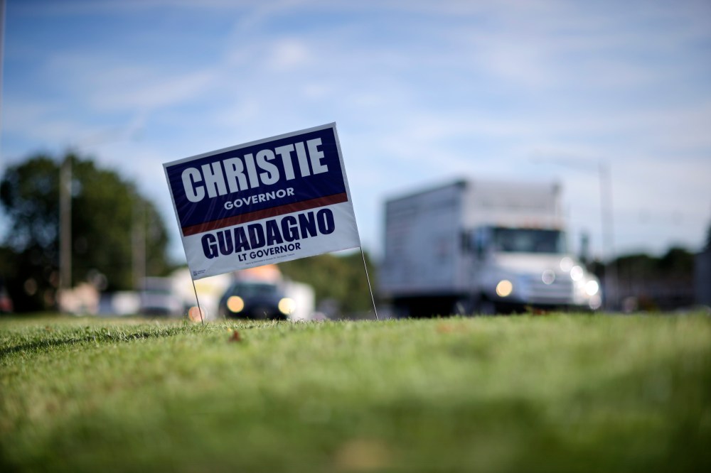 A campaign sign for New Jersey Gov. Chris Christie and Lt. Gov. Kim Guadagno is seen along a highway in Edison, N.J., Tuesday, Oct. 8, 2013.