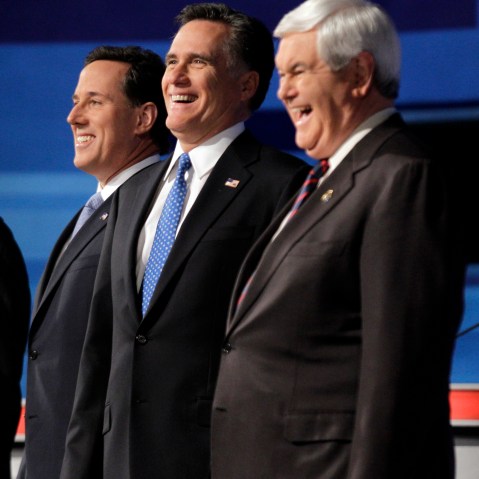 FILE - In this Jan. 16, 2012 file photo Republican presidential candidates former Pennsylvania Sen. Rick Santorum, former Massachusetts Gov. Mitt Romney and former House Speaker Newt Gingrich pose for a photo at the start of the South Carolina...