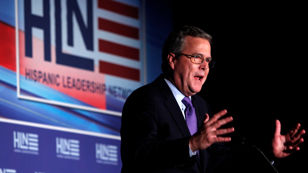 Former Fla. Gov. Jeb Bush gestures as he speaks at the Hispanic Leadership Network's conference, Jan. 26, 2012.