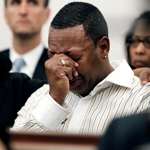 A family member cries as Barbara Anderson Young, sister of James Craig Anderson, reads a statement in Hinds County Circuit Court, March 21, 2012 in Jackson, Miss. (Photo by Rogelio V. Solis/AP)