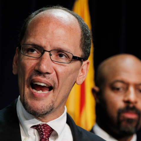 File Photo: Thursday, May 10, 2012 file photo, United States Assistant Attorney General Thomas Perez, left, who heads up the civil rights division at the Department of Justice, is joined by Deputy Assistant Attorney General for Civil Rights, Roy Austin...