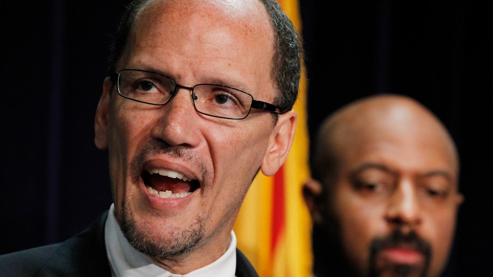 File Photo: Thursday, May 10, 2012 file photo, United States Assistant Attorney General Thomas Perez, left, who heads up the civil rights division at the Department of Justice, is joined by Deputy Assistant Attorney General for Civil Rights, Roy Austin...