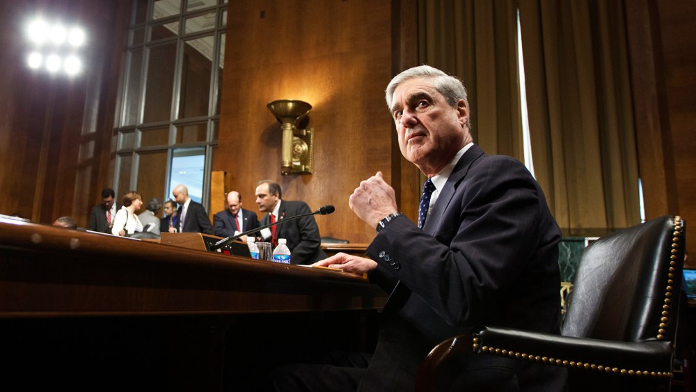 Then FBI Director Robert Mueller arrives on Capitol Hill in Washington, D.C., May 16, 2012, to testify during a hearing.
