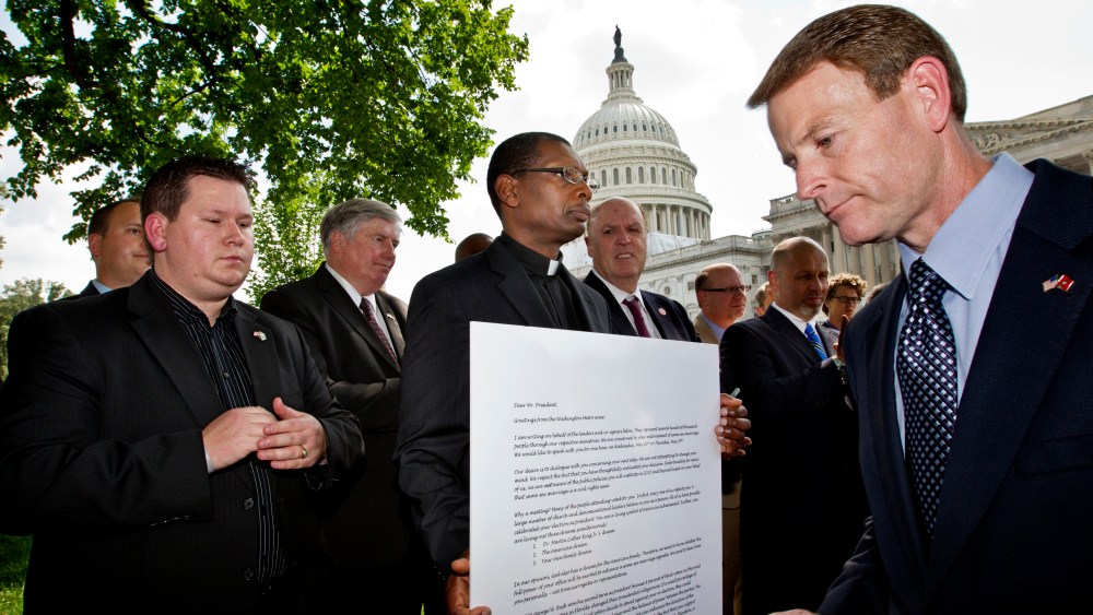 Family Research Council President Tony Perkins finishes his speech denouncing gay marriage as a group of pastors gather on Capitol Hill in Washington, May 24, 2012, to show their support for the Defense of Marriage Act. (Photo by J. Scott Applewhite/AP)