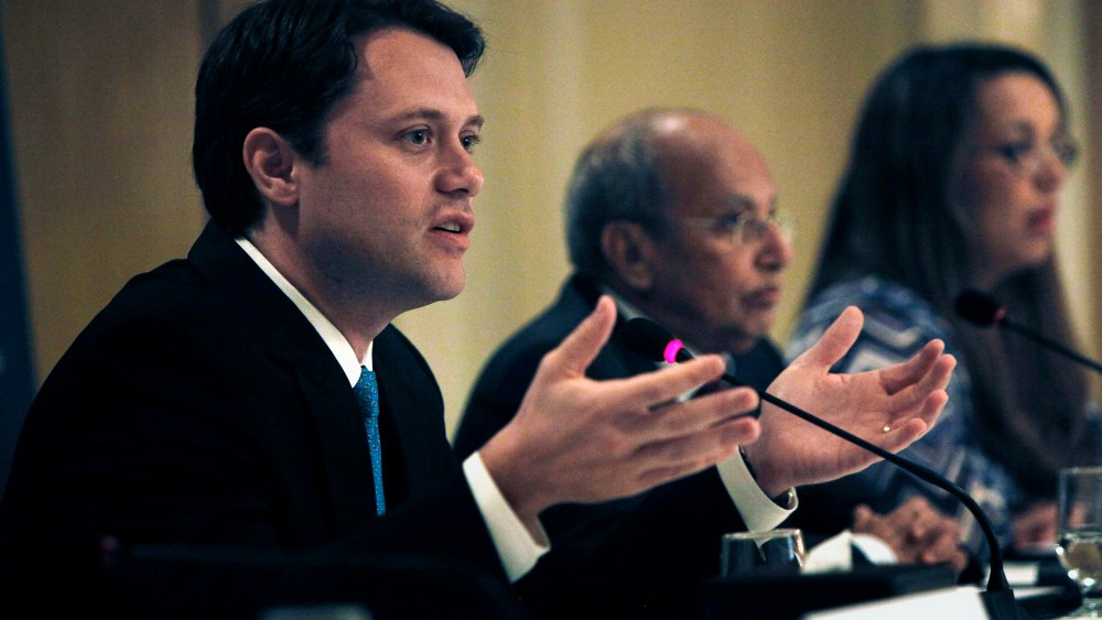 Senator Jason Carter, left, talks during a press conference for the Carter Center's election witnessing mission in Egypt, in Cairo, Egypt, Tuesday, June 19, 2012.