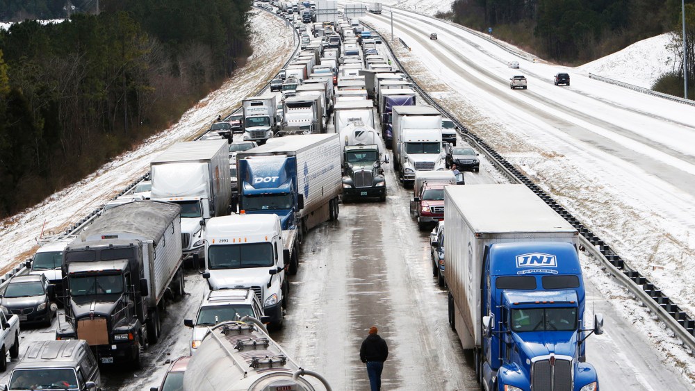 Traffic is at a standstill on Interstate 65 northbound as officials work to clear abandoned vehicles in Hoover, Ala. Jan.  29, 2014.