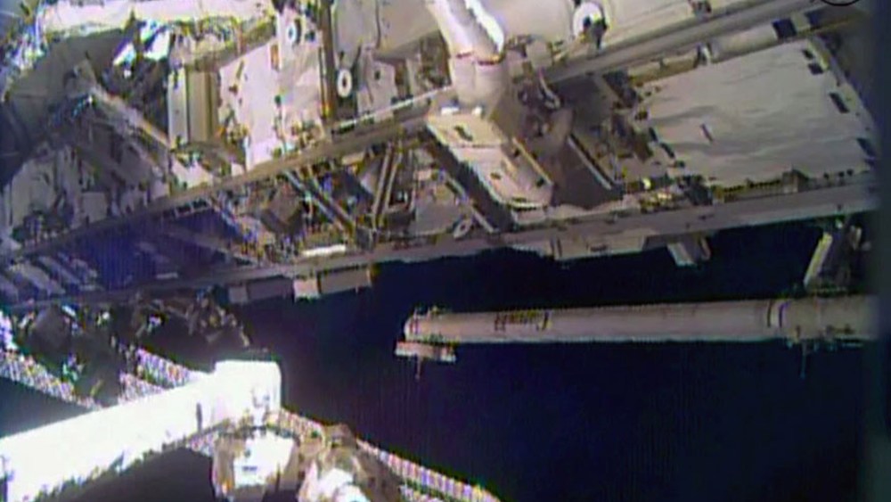 In this image made from video provided by NASA, astronaut Rick Mastracchio performs a space walk outside the International Space Station on Saturday, Dec. 21, 2013.