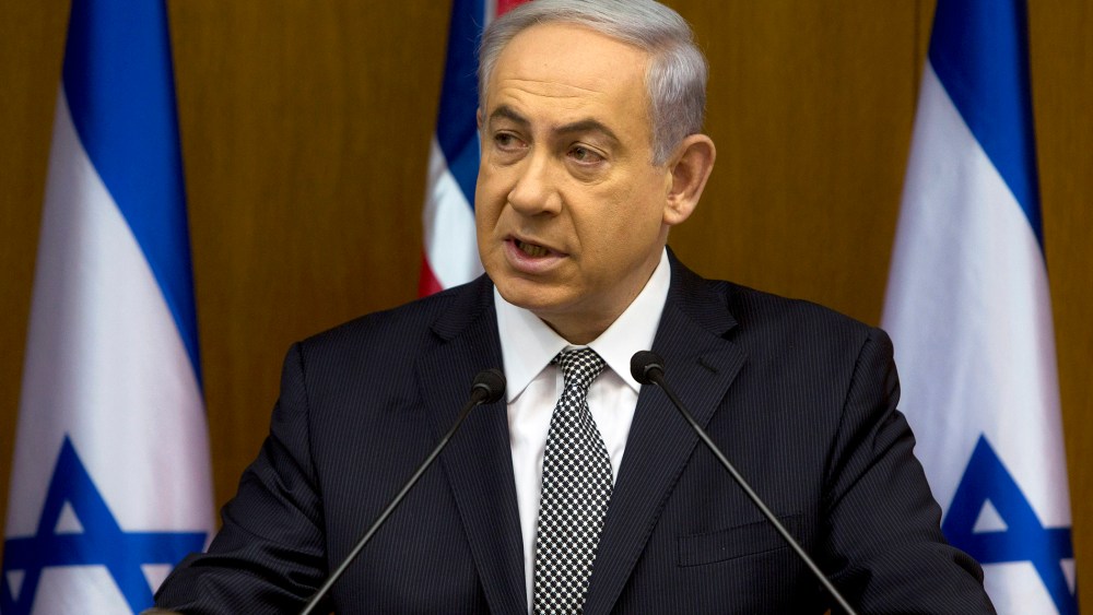 Israeli Prime Minister Benjamin Netanyahu speaks during joint statements with British Foreign Secretary Philip Hammond at the Knesset, Israel's parliament in Jerusalem, July 24, 2014.
