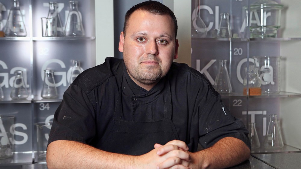 In this Nov. 7, 2013 photo Chef Homaro Cantu poses for a photo at his restaurant Moto in Chicago. (Photo by Chandler West/Sun-Times Media/AP)