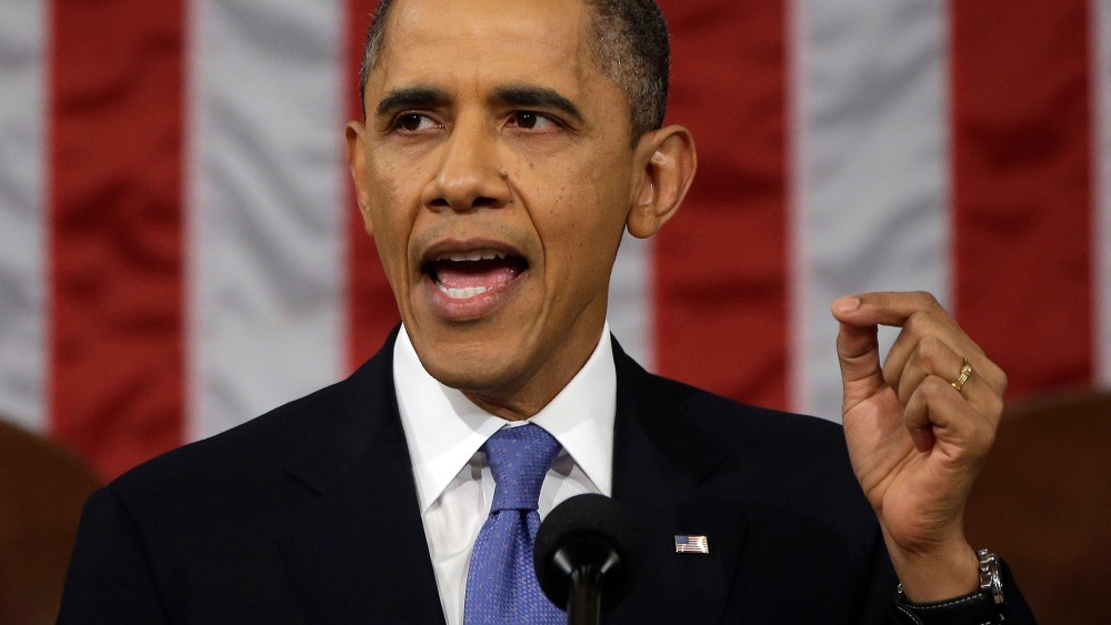 President Barack Obama gestures as he gives his State of the Union address during a joint session of Congress on Capitol Hill in Washington, Tuesday Feb. 12, 2013. (Photo by Charles Dharapak/AP)