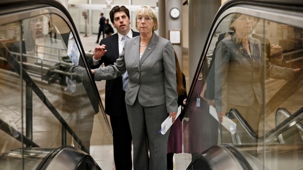 Senate Budget Committee Chairwoman Patty Murray, D-Wash., who negotiated a bipartisan budget compromise with Rep. Paul Ryan, R-Wis., the House Budget Committee chairman, takes an escalator to the Senate for votes on nominations late Dec. 16, 2013, at the
