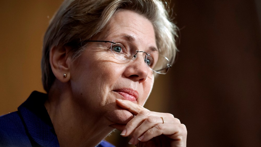 Sen. Elizabeth Warren, D-Mass., listens to a witness at Senate Banking Committee hearing on anti-money laundering on Capitol Hill in Washington on March 7, 2013. (Photo by Cliff Owen/AP)
