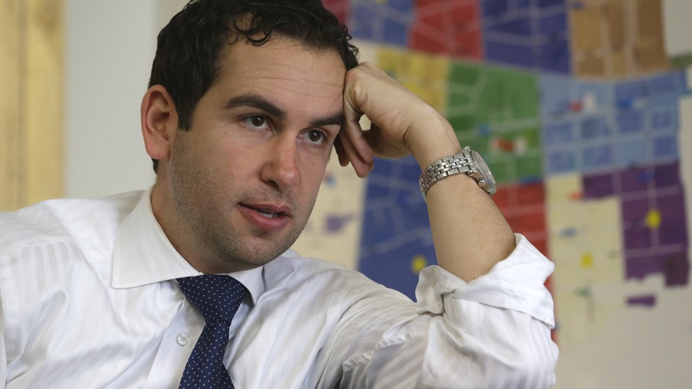 In this Friday, March 15, 2013 photo, Steven Fulop talks to The Associated Press at his campaign headquarters in Jersey City, N.J.