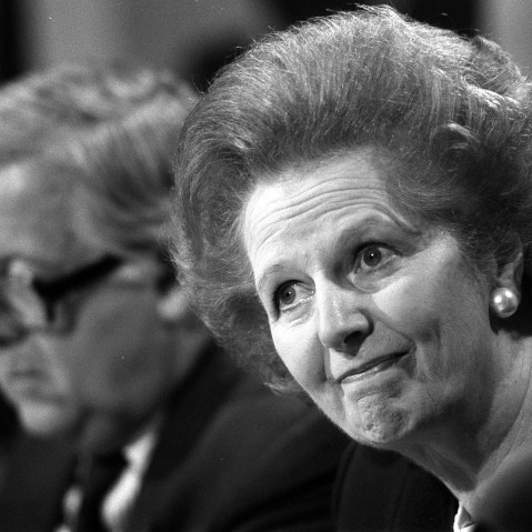 File photo dated 22/5/89 of Margaret Thatcher fielding questions with Foreign Secretary, Geoffrey Howe (background), at a press conference, in London. (Photo by Martin Keene/Press Association via AP Images, File)
