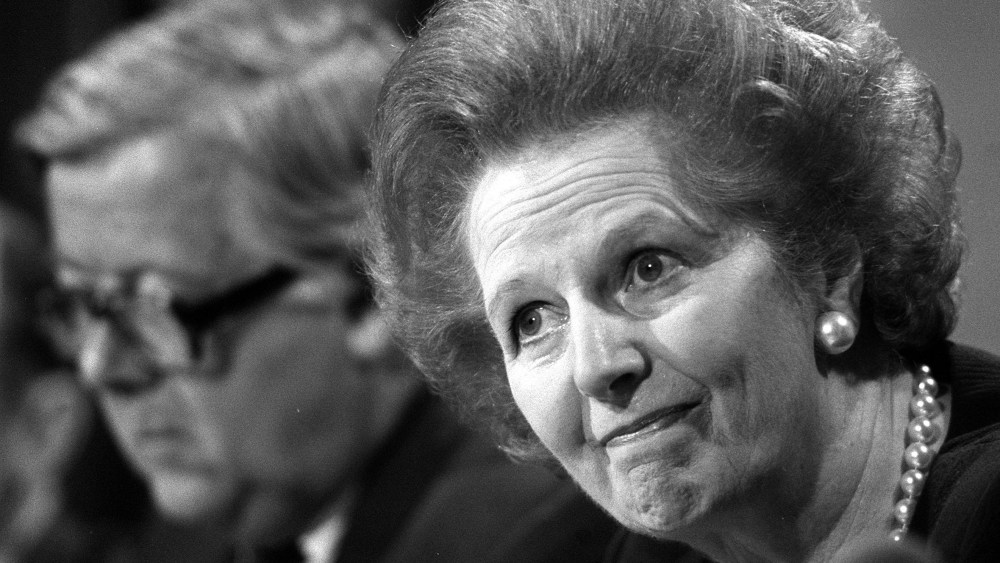 File photo dated 22/5/89 of Margaret Thatcher fielding questions with Foreign Secretary, Geoffrey Howe (background), at a press conference, in London. (Photo by Martin Keene/Press Association via AP Images, File)