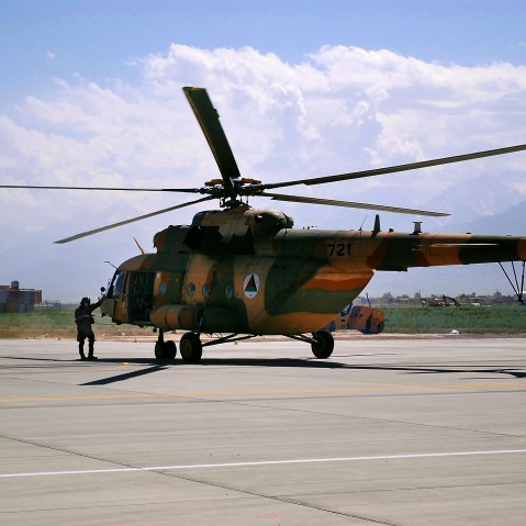 FILE - In this May 13, 2013 file photo, an Mi-17 helicopter used by the Afghan Air Force sits on Bagram Air Field in Afghanistan. (AP Photo/Kristin M. Hall, File)
