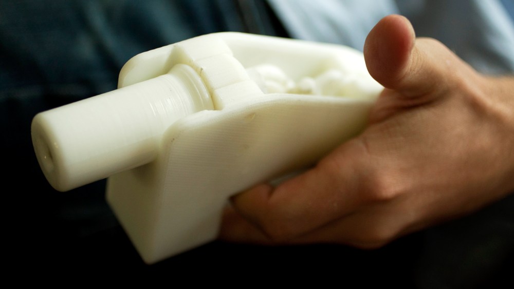 Cody Wilson with the first completely 3D-printed handgun, The Liberator, at his home in Austin, Texas on May 10, 2013.