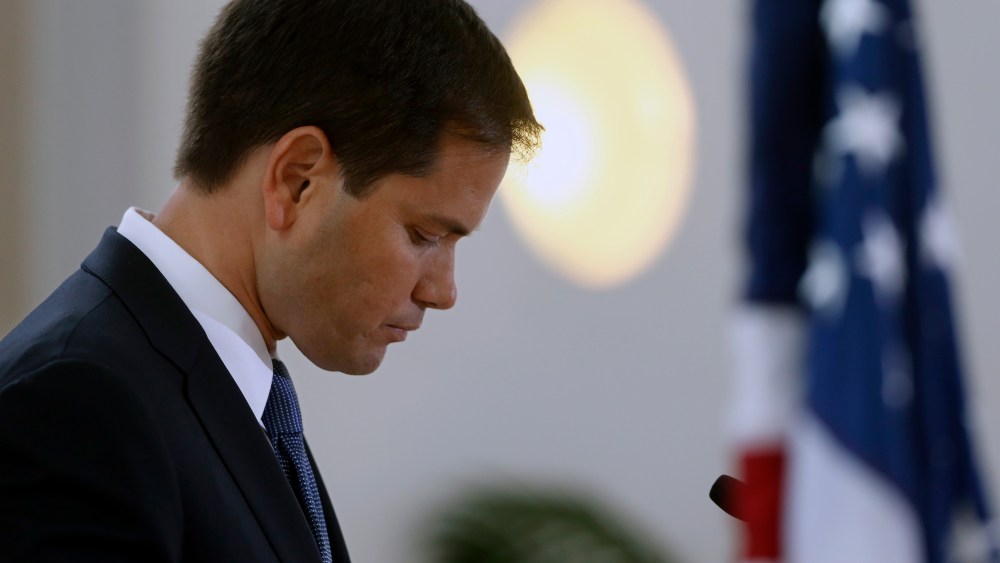 Sen. Marco Rubio, R-Fla., looks at his notes as he speaks at the Faith and Freedom Coalition Road to Majority Conference in Washington on Thursday, June 13, 2013.