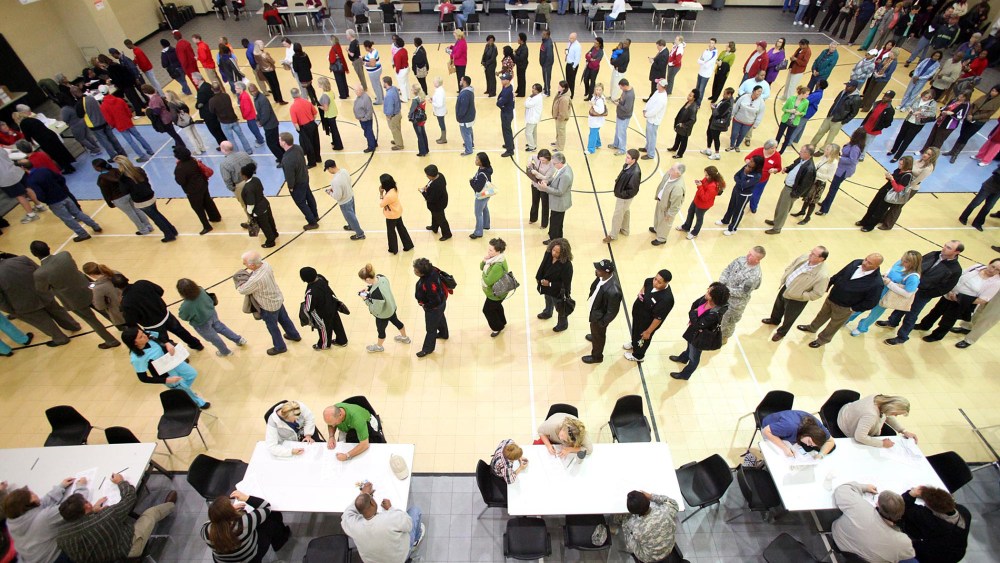 Voters wait in line at the Bobby Miller Activity Center in Tuscaloosa, Ala., Tuesday, Nov. 6, 2012.