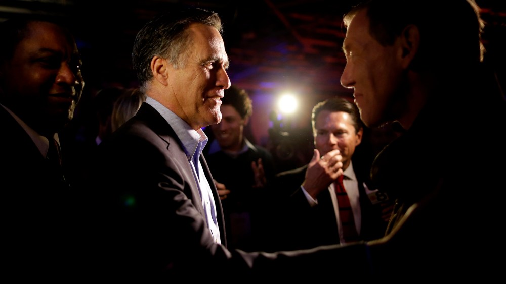 Mitt Romney, the former Republican presidential nominee, greets people after speaking during the Republican National Committee's winter meeting aboard the USS Midway Museum, Jan. 16, 2015, in San Diego. (Photo by Gregory Bull/AP)